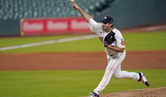 Houston Astros starting pitcher Justin Verlander throws against the Seattle Mariners during the third inning of a baseball game Friday, July 24, 2020, in Houston. (AP Photo/David J. Phillip)