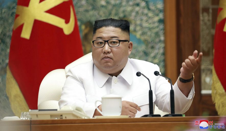 In this photo provided by the North Korean government, North Korean leader Kim Jong Un attends an emergency Politburo meeting in Pyongyang, North Korea Saturday, July 25, 2020. Independent journalists were not given access to cover the event depicted in this image distributed by the North Korean government. The content of this image is as provided and cannot be independently verified. Korean language watermark on image as provided by source reads: &amp;quot;KCNA&amp;quot; which is the abbreviation for Korean Central News Agency. (Korean Central News Agency/Korea News Service via AP)