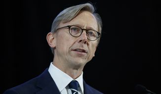 In this Nov. 29, 2018, photo, Brian Hook, U.S. special representative for Iran, speaks at the Iranian Materiel Display at Joint Base Anacostia-Bolling in Washington. The U.S. continues to push for an end of the four-nation boycott of Qatar, even after the hospitalization of Kuwait&#39;s ruling emir who led talks to resolve the yearslong dispute, Hook told journalists Sunday, July 26, 2020. (AP Photo/Carolyn Kaster) **FILE**