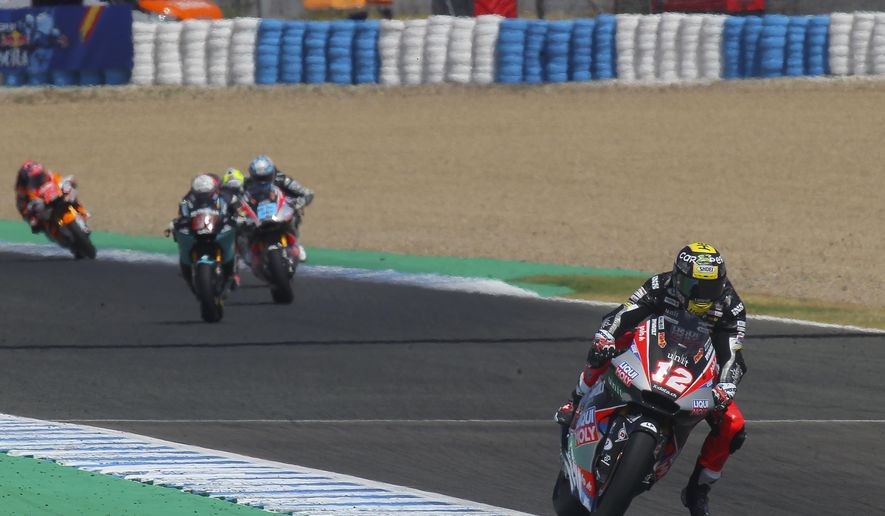 Moto2 rider Thomas Luthi of Switzerland, right, rides during the Andalucia Motorcycle Grand Prix at the Angel Nieto racetrack in Jerez de la Frontera, Spain, Sunday July 26, 2020. (AP Photo/David Clares)