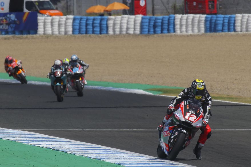 Moto2 rider Thomas Luthi of Switzerland, right, rides during the Andalucia Motorcycle Grand Prix at the Angel Nieto racetrack in Jerez de la Frontera, Spain, Sunday July 26, 2020. (AP Photo/David Clares)