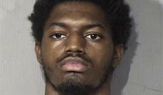 This undated mugshot provided by the Maricopa County Sheriff&#39;s Office in Phoenix shows 18-year-old Javian Ezell of Shreveport, Louisiana. Authorities say he and another teen have been arrested in the killing of an Arizona State University professor whose body was found in a landfill earlier this month. (Maricopa County Sheriff&#39;s Office via The AP)
