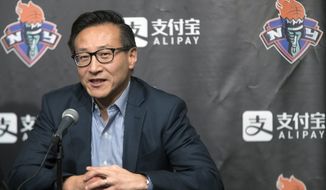 FILE - In this May 9, 2019, file photo, Joe Tsai speaks to reporters during a news conference before a WNBA exhibition basketball game between the New York Liberty and China in New York. Coming from the business world, Liberty owner Tsai did not understand why his franchise did not have a CEO similar to the team&#39;s NBA counterpart the Brooklyn Nets. He changed that, promoting Keia Clarke to the position last week, the first CEO in team history.  (AP Photo/Mary Altaffer, File)