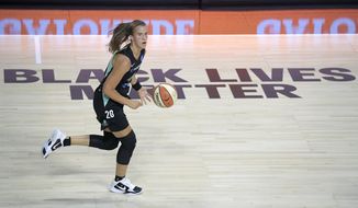 New York Liberty forward Sabrina Ionescu (20) pushes the ball up the court during the first half of a WNBA basketball game against the Seattle Storm, Saturday, July 25, 2020, in Ellenton, Fla. (AP Photo/Phelan M. Ebenhack)
