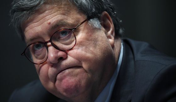 Attorney General William Barr testifies before the House Oversight Committee on Capitol Hill in Washington, Tuesday,  28, 2020. (Matt McClain/The Washington Post via AP, Pool)