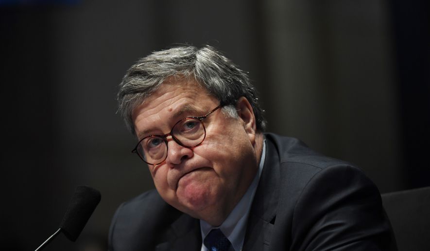 Attorney General William Barr testifies before the House Oversight Committee on Capitol Hill in Washington, Tuesday,  28, 2020. (Matt McClain/The Washington Post via AP, Pool)