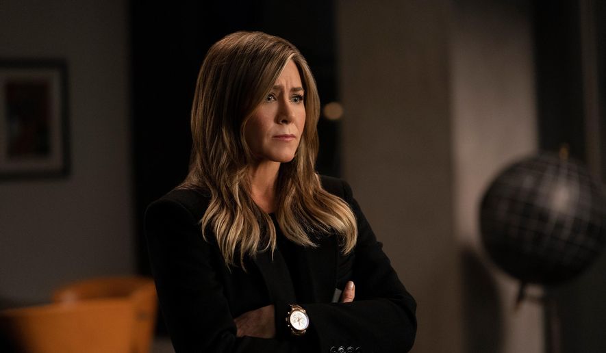 This image released by Apple TV Plus shows Jennifer Aniston in a scene from &quot;The Morning Show.&quot; Aniston was nominated for an Emmy Award for outstanding lead actress in a drama series on Tuesday, July 28, 2020. (Apple TV Plus via AP) ** FILE **