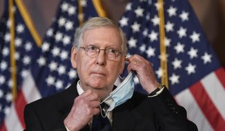 Senate Majority Leader Mitch McConnell of Ky., listens to a question during a news conference on Capitol Hill in Washington, Monday, July 27, 2020, to highlight the new Republican coronavirus aid package. (AP Photo/Susan Walsh)