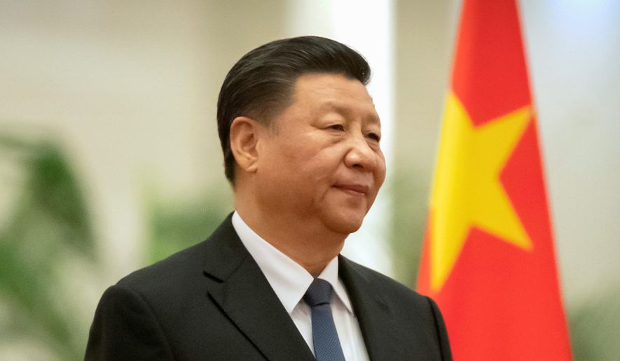 Chinese President Xi Jinping is rumored to be engaged in a power struggle that has shifted rhetoric and heightened military readiness. (Associated Press/File)