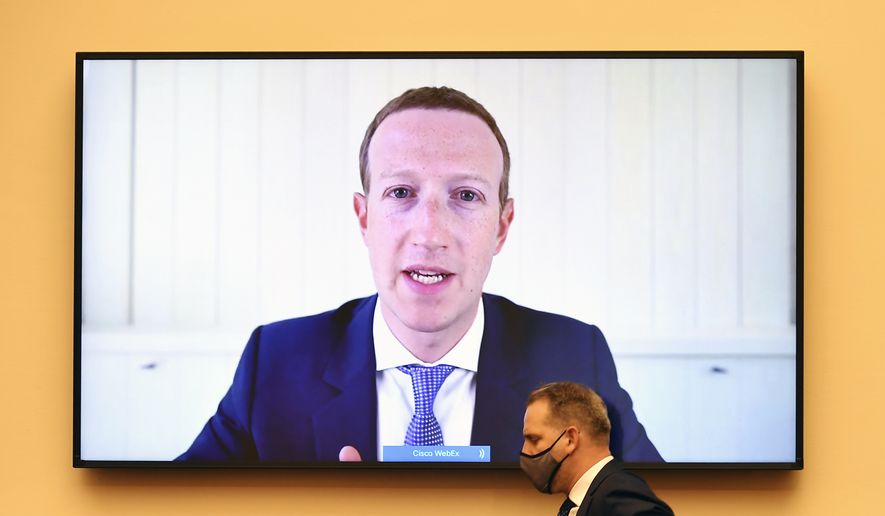 Facebook CEO Mark Zuckerberg testifies remotely during a House Judiciary subcommittee hearing on antitrust on Capitol Hill on Wednesday, July 29, 2020, in Washington. (Mandel Ngan/Pool via AP) ** FILE **