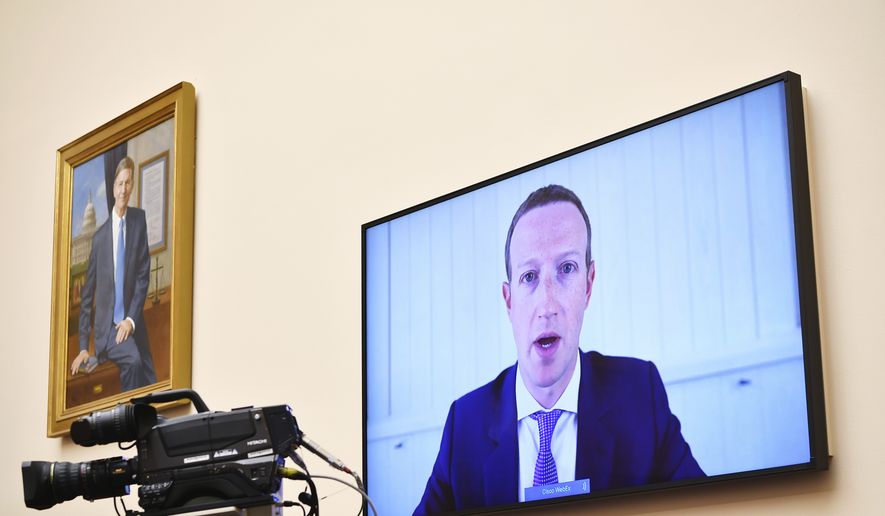 Facebook CEO Mark Zuckerberg testifies remotely during a House Judiciary subcommittee on antitrust on Capitol Hill on Wednesday, July 29, 2020, in Washington. (Mandel Ngan/Pool via AP) ** FILE **