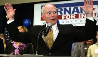 FILE - In this Tuesday, Nov. 2, 2004, file photo, Indiana Gov. Joe Kernan acknowledges the applause of supporters as he concedes to Republican challenger Mitch Daniels in the race for governor in Indianapolis. Former Indiana Gov. Joe Kernan has lost the ability to speak due to Alzheimer&#39;s disease and is living in a care facility, according to a report confirmed by his former press secretary Wednesday, July 8, 2020. (AP Photo/Michael Conroy, File)