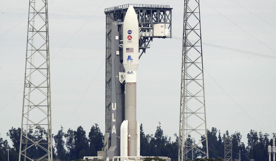 A United Launch Alliance Atlas V rocket that will launch to Mars arrives at Space Launch Complex 41 at the Cape Canaveral Air Force Station, Tuesday, July 28, 2020, in Cape Canaveral, Fla. The rocket scheduled to launch on Thursday will land on Mars in February 2021 and the Mars 2020 rover, named Perseverance, will study Martian geology. (AP Photo/John Raoux)