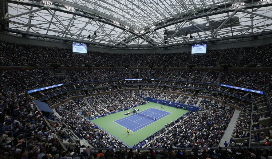 FILE - This is a Sept. 9, 2018, file photo showing Novak Djokovic, of Serbia, and Juan Martin del Potro, of Argentina, playing in the men's final of the U.S. Open tennis tournament in New York. The Citi Open in Washington, scheduled to start with Aug. 13 qualifying, was called off Tuesday, July 21, 2020, because of what tournament manager Mark Ein said are “too many unresolved external issues, including various international travel restrictions as well as troubling health and safety trends.” With Washington’s hard-court tournament now gone, the first chance for men to play sanctioned matches will be the Masters-level event usually played in Cincinnati that was moved to the site of the U.S. Open, starting Aug. 22. (AP Photo/Jason DeCrow, File)