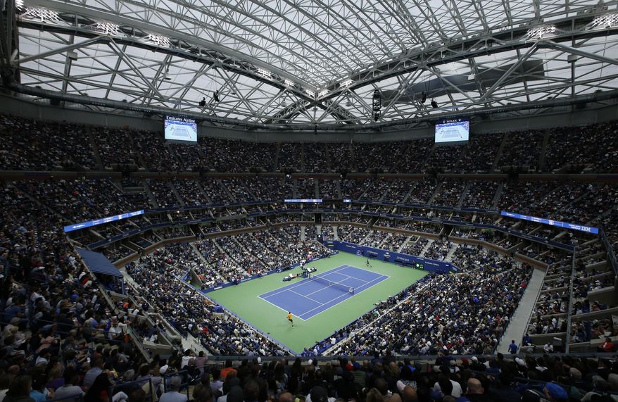 FILE - This is a Sept. 9, 2018, file photo showing Novak Djokovic, of Serbia, and Juan Martin del Potro, of Argentina, playing in the men's final of the U.S. Open tennis tournament in New York. The Citi Open in Washington, scheduled to start with Aug. 13 qualifying, was called off Tuesday, July 21, 2020, because of what tournament manager Mark Ein said are “too many unresolved external issues, including various international travel restrictions as well as troubling health and safety trends.” With Washington’s hard-court tournament now gone, the first chance for men to play sanctioned matches will be the Masters-level event usually played in Cincinnati that was moved to the site of the U.S. Open, starting Aug. 22. (AP Photo/Jason DeCrow, File)