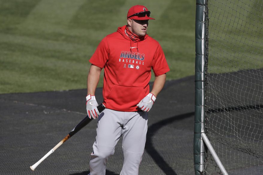 Los Angeles Angelsl Mike Trout takes batting practice before a baseball game between the Oakland Athletics and the Angels in Oakland, Calif., Friday, July 24, 2020. (AP Photo/Jeff Chiu)