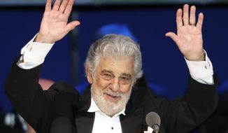 FILE- In this Aug. 28, 2019, file photo, opera singer Placido Domingo performs during a concert in Szeged, Hungary. Domingo will make his first public appearance since recovering from coronavirus to accept a lifetime achievement award on Aug. 6 in Salzburg, Austria. (AP Photo/Laszlo Balogh, File)