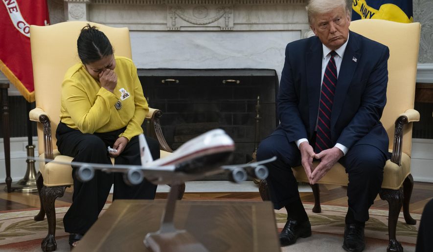 Gloria Guillen, the mother of slain Army Spc. Vanessa Guillen, meets with President Donald Trump in the Oval Office of the White House on Thursday, July 30, 2020, in Washington.