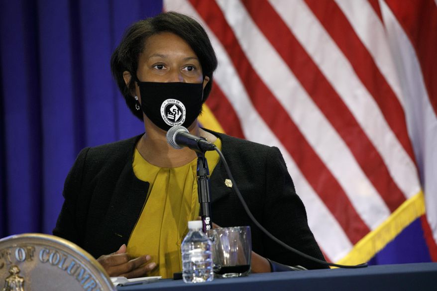 District of Columbia Mayor Muriel Bowser speaks during an announcement that District of Columbia public schools will be all virtual through Nov. 6, during a news conference, Thursday, July 30, 2020, in Washington. (AP Photo/Jacquelyn Martin) **FILE**