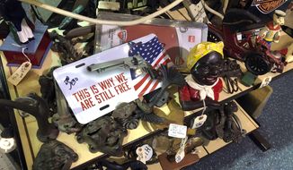 Items are for sale at Exit 76 Antique Mall in Edinburgh, Indiana, Tuesday, July 21, 2020. U.S. Rep. Greg Pence, the older brother of Vice President Mike Pence, is coming under criticism for allowing the sale of objects with racist depictions of African Americans at the sprawling antiques mall the congressman owns with his wife. (AP Photo/Casey Smith)