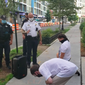 Metropolitan Police Department officers are shown in this video screen capture, just before they arrest two pro-life demonstrators with Students for Life of America in Northeast D.C. on August 1, 2020. The demonstrators were chalking the public sidewalk Saturday morning, an act an officer in the video said violated a law against defacing public property. For their part, the demonstrators claim they have done sidewalk chalkings every Saturday for the past few weeks without incident, and that the arrest is in violation of their free-speech rights. (Video courtesy of Students for Life of America)