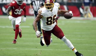 FILE - In this Sept. 9, 2018, file photo, Washington Redskins tight end Jordan Reed (86) runs with the ball during an NFL football game against the Arizona Cardinals in Glendale, Ariz. The San Francisco 49ers have agreed on a one-year contract with Jordan. (AP Photo/Rick Scuteri, File)