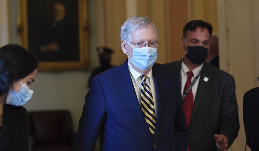 Senate Majority Leader Mitch McConnell of Ky., walks back to his office on Capitol Hill in Washington, Monday, Aug. 3, 2020. (AP Photo/Susan Walsh)