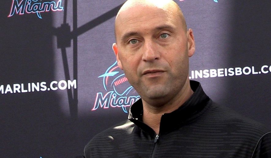 FILE - In this Feb. 24, 2020, file photo, Miami Marlins CEO Derek Jeter talks to the media before the team plays the St. Louis Cardinals in a baseball game in Jupiter, Fla. Jeter blames the team’s coronavirus outbreak on a collective false sense of security that made players lax about social distancing and wearing masks. Infected were 21 members of the team’s traveling party, including at least 18 players. (Charles Trainor Jr./Miami Herald via AP, File)