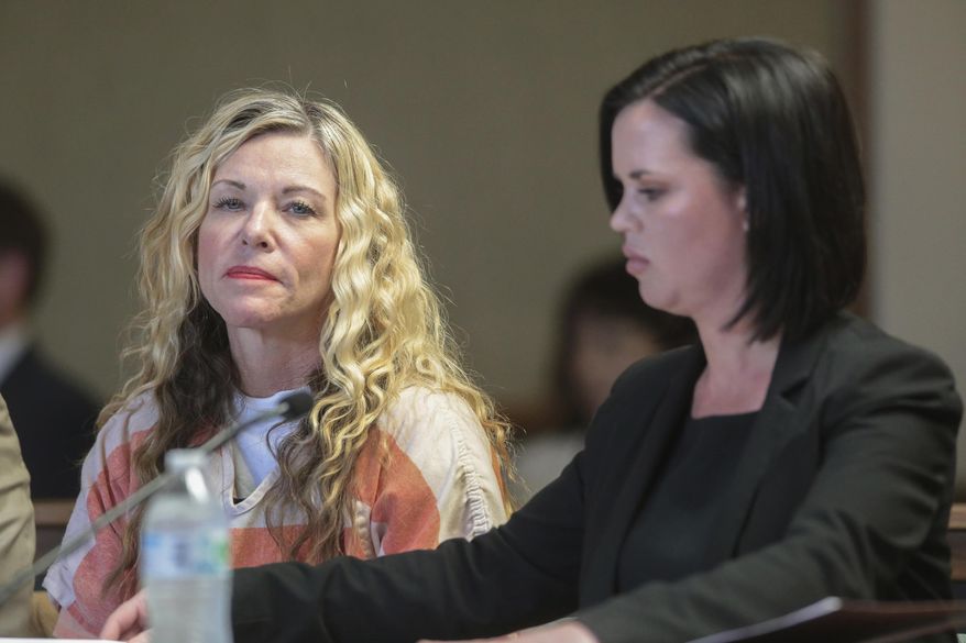 In this March 6, 2020, file photo, Lori Vallow Daybell glances at the camera during her hearing, with her defense attorney, Edwina Elcox, right, in Rexburg, Idaho. An Idaho prosecutor is expected Monday, Aug. 3, 2020, to begin sketching out his case against an Idaho couple at the center of a bizarre missing children&#39;s case that ended in tragedy when their bodies were found buried on a rural eastern Idaho property earlier this year. Chad Daybell married the kids&#39; mom, Lori Daybell, late last year, and she&#39;s charged with conspiring to help keep the bodies hidden. Both Daybells have pleaded not guilty. (John Roark/The Idaho Post-Register via AP, Pool, File)
