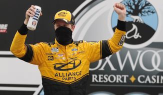 Driver Brad Keselowski celebrates after winning a NASCAR Cup Series auto race, Sunday, Aug. 2, 2020, at the New Hampshire Motor Speedway in Loudon, N.H. (AP Photo/Charles Krupa)