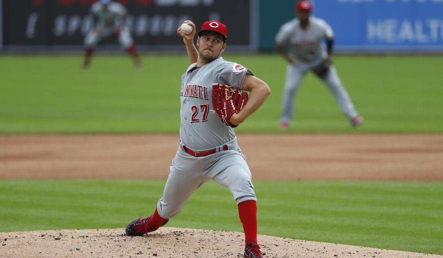 Cincinnati Reds pitcher Trevor Bauer throws to a Detroit Tigers batter during the first inning of the second baseball game of a doubleheader in Detroit, Sunday, Aug. 2, 2020. (AP Photo/Paul Sancya)