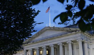 This Thursday, June 6, 2019, photo shows the U.S. Treasury Department building at dusk, in Washington. (AP Photo/Patrick Semansky, File)  **FILE**
