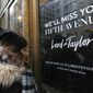 In this Jan. 2, 2019, file photo, women peer in the front door of Lord &amp;amp; Taylor&#39;s flagship Fifth Avenue store, which closed for good in New York. New York landmark retailer Lord &amp;amp; Taylor has filed for bankruptcy, joining a growing list of retailers flummoxed by the pandemic. (AP Photo/Kathy Willens, File)