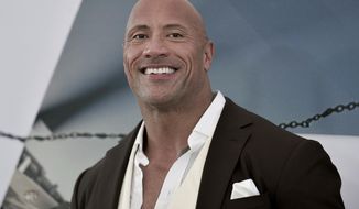 FILE - Dwayne Johnson attends the premiere of &amp;quot;Fast &amp;amp; Furious Presents: Hobbs &amp;amp; Shaw&amp;quot; on July 13, 2019, in Los Angeles. Johnson said he has acquired the XFL. The 48-year-old actor made the announcement on Twitter. Reportedly the price is $15 million. The XFL had eight franchises and played five games out of a planned 10-game schedule before canceling the remainder of its season in March because of the COVID-19 pandemic. (Photo by Richard Shotwell/Invision/AP, File)