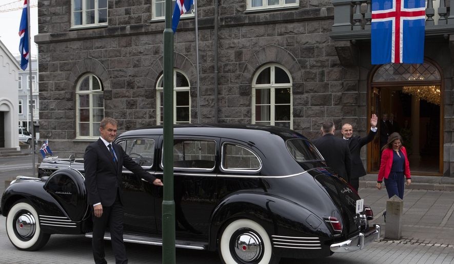 Iceland&#x27;s President Guðni Th. Jóhannesson waves as he gets into a car following his inauguration in Reykjavik, Iceland Saturday, Aug. 1, 2020. In Iceland, a nation so safe that its president runs errands on a bicycle, U.S. Ambassador Jeffery Ross Gunter has left locals aghast with his request to hire armed bodyguards. He&#x27;s also enraged lawmakers by casually and groundlessly hitching Iceland to President Donald Trump&#x27;s controversial &amp;quot;China virus” label for the coronavirus. (AP Photo/Árni Torfason)