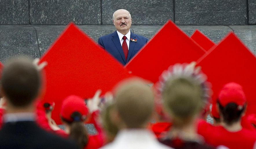 FILE In this file photo taken on Friday, July 3, 2020, Belarus President Alexander Lukashenko looks on during Independence Day celebrations, in Minsk, Belarus. Lukashenko, a 65-year-old former Soviet state farm director, who has ruled Belarus with an iron fist for 26-years, has faced the largest opposition protests against his rule as he runs for re-election in Sunday&#x27;s presidential vote. (AP Photo/Sergei Grits, File)