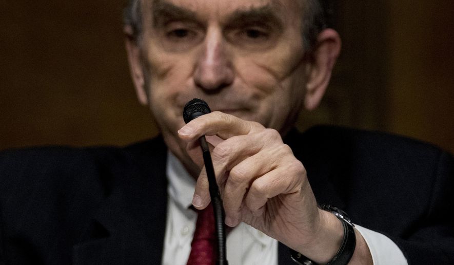 State Department Special Representative for Venezuela Ambassador Elliott Abrams prepares to testify at a Senate Foreign Relations Committee hearing on Capitol Hill in Washington, Tuesday, Aug. 4, 2020. (AP Photo/Andrew Harnik)
