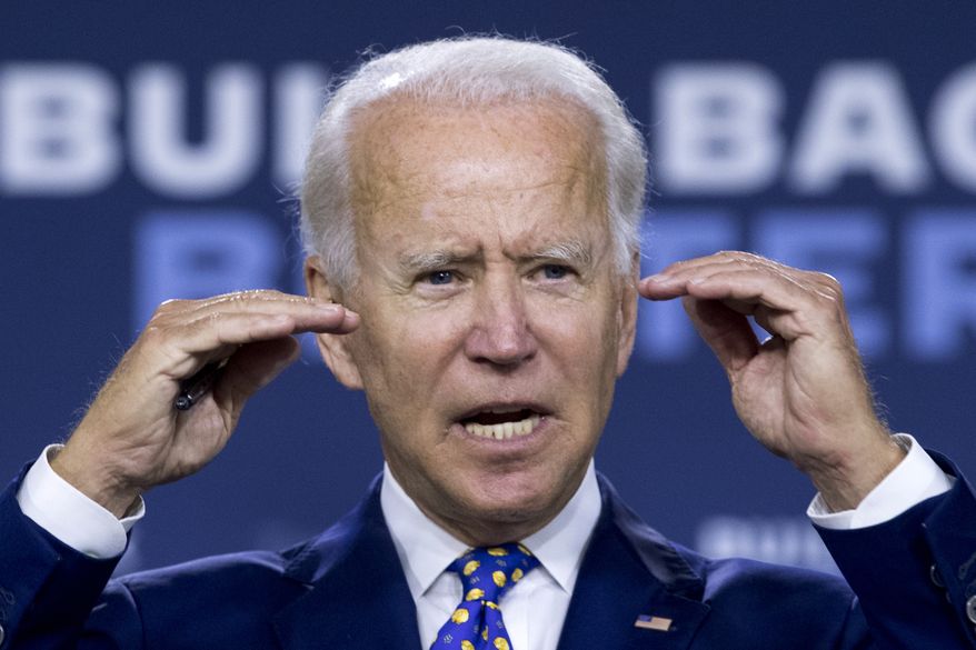 In this July 28, 2020, photo, Democratic presidential candidate and former Vice President Joe Biden speaks at a campaign event at the William "Hicks" Anderson Community Center in Wilmington, Del. Biden will not travel to Milwaukee to accept Democratic presidential nomination. (AP Photo/Andrew Harnik) **FILE**