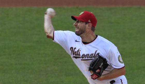 Washington Nationals starting pitcher Max Scherzer (31) throws during the first inning of a baseball game against the New York Mets in Washington, Wednesday, Aug. 5, 2020. (AP Photo/Manuel Balce Ceneta)