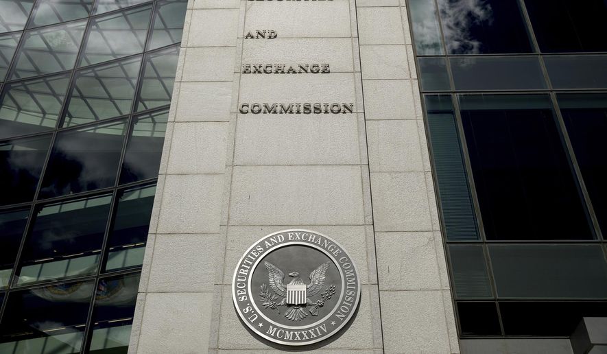 This Saturday, Aug. 5, 2017, photo shows the U.S. Securities and Exchange Commission building in Washington. (Andrew Harnik/The Associated Press) **FILE**