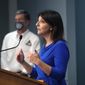 Dr. Mandy Cohen, secretary of the state Department of Health and Human Services, answers a question during a briefing at the Emergency Operations Center in Raleigh, N.C., Wednesday, August 5, 2020.  (Ethan Hyman/The News &amp;amp; Observer via AP)