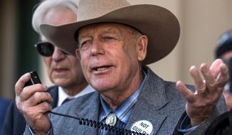 FILE - In this Jan. 10, 2018 file photo, Cliven Bundy talks to reporters outside Las Vegas Metropolitan Police Headquarters in Las Vegas. The 9th U.S. Circuit Court of Appeal in San Francisco on Thursday, Aug. 6, 2020, denied prosecutors&#39; efforts to overturn U.S. District Judge Gloria Navarro&#39;s decision to stop a months-long trial in January 2018 due to prosecutorial misconduct and her order dismissing the case so it could not be re-filed. (L.E. Baskow/Las Vegas Sun via AP, File)