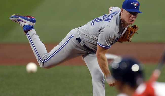 Toronto Blue Jays' Chase Anderson pitches during the first inning of a baseball game against the Boston Red Sox, Saturday, Aug. 8, 2020, in Boston. (AP Photo/Michael Dwyer)