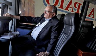FILE - In this Aug. 23, 2018, file photo, U.S. Senate candidate and former Maricopa County Sheriff Joe Arpaio rides on his campaign bus in Phoenix. Arpaio&#39;s primary defeat in his bid to win back the sheriff&#39;s post in metro Phoenix marks what&#39;s likely to be the 88-year-old&#39;s last political campaign. (AP Photo/Matt York, File)