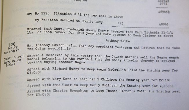 A paragraph in the Colonial Vestry Book of Lynnhaven Parish Princess Anne County Virginia 1723-1786 shows an entry of slave was bought and sold, is shown Monday, June 29, 2020 in Virginia Beach, Va. The&#x27; N. Pham/The Virginian-Pilot via AP)