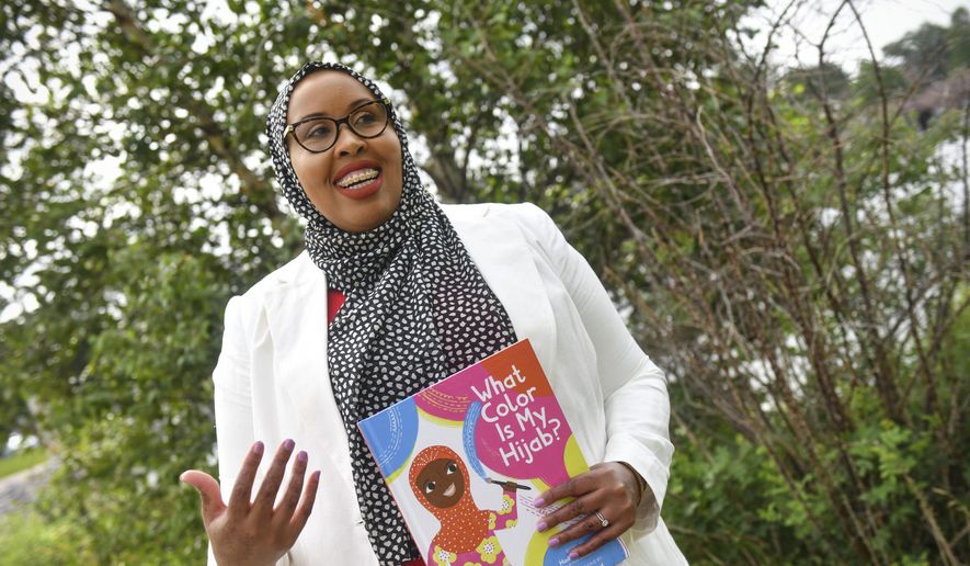 Hudda Ibrahim talks about her new children&#39;s book &amp;quot;What Color Is My Hijab&amp;quot; during an interview Tuesday, June 30, 2020, in St. Cloud, Minn. (Dave Schwarz/The St. Cloud Times via AP) ** FILE **