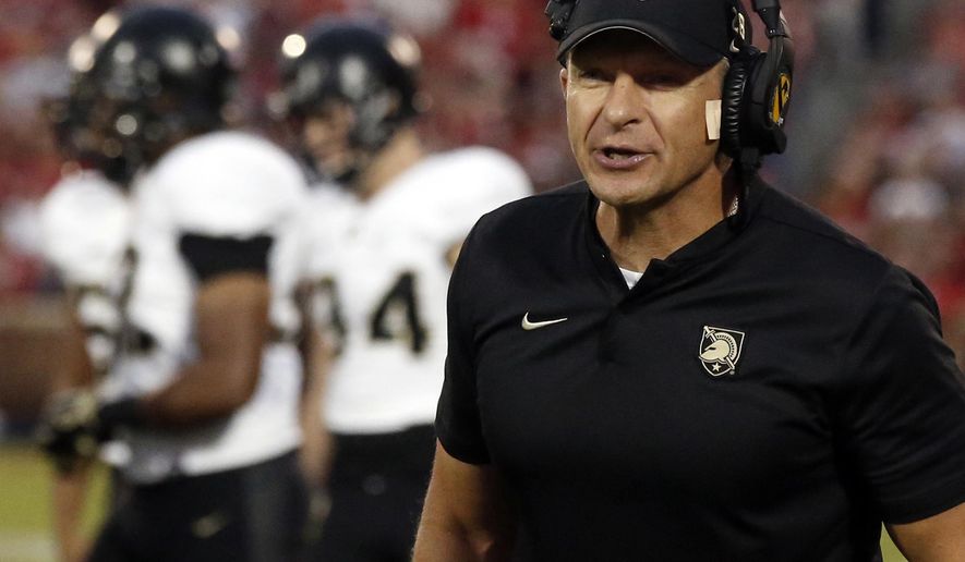 FILE - In this Sept. 22, 2018, file photo, Army head coach Jeff Monken shouts in the first half of an NCAA college football game against Oklahoma in Norman, Okla. College football coaches are facing the daunting challenge of getting their players to maintain the required focus to prepare for season-openers when the prevailing question swirling around the sport is when, or if, the season will even be played because of the worldwide coronavirus pandemic. (AP Photo/Sue Ogrocki, File)