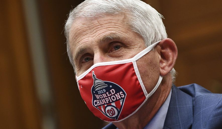 Dr. Anthony Fauci, director of the National Institute for Allergy and Infectious Diseases, testifies during a House Subcommittee hearing on the Coronavirus crisis, Friday, July 31, 2020 on Capitol Hill in Washington.  (Kevin Dietsch/Pool via AP)