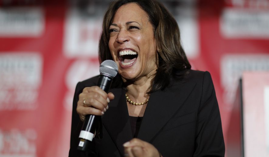 In this Nov. 8, 2019, file photo, then-Democratic presidential candidate Sen. Kamala Harris, D-Calif., reacts as she speaks at a town hall event at the Culinary Workers Union in Las Vegas. Democratic presidential candidate former Vice President Joe Biden has chosen  Harris as his running mate. (AP Photo/John Locher, File)