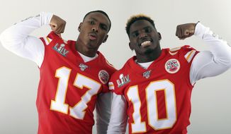 FILE - In this Jan. 27, 2020, filer photo, Kansas City Chiefs&#x27; Mecole Hardman (17) and Tyreek Hill (10) pose for a photo in Miami. The two Chiefs wide receivers have traded barbs about their speed ever since Hardman was chosen in the second round of last year&#x27;s draft. Hardman and Hill both have world-class speed — that much was never in question — but just who was the fastest man in Kansas City wasn&#x27;t settled until the two lined up in the team&#x27;s indoor facility this past week.Hill won easily. Hardman copped to it on social media with a sad-face emoji. (AP Photo/Doug Benc, File)